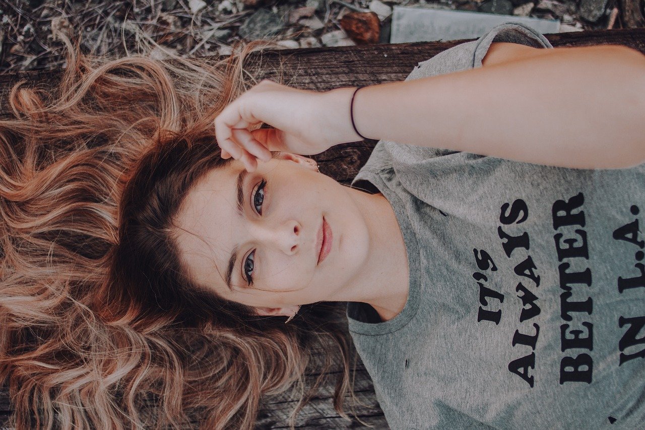 about-us woman, portrait, people, fashion, young, girl, model, relaxation, beautiful, pretty, attractive, outdoors, adult, brunette, face, hair, care, female, skincare
